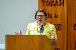 Annual Meeting 2025, Rabbi Michelle Stern at Podium Annual Meeting 2025, Rabbi Michelle Stern at Podium