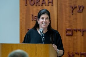 Annual Meeting 2025, Dana Hirt at podium Annual Meeting 2025, Dana Hirt at podium