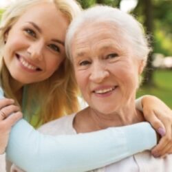 Mother and daughter together facing the camera