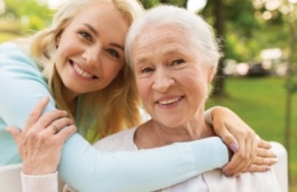Mother and daughter together facing the camera